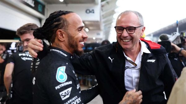 Stefano Domenicali and Lewis Hamilton (via Getty Images)