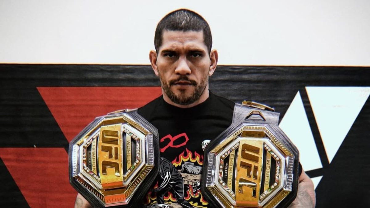 Alex Pereira with his UFC belts