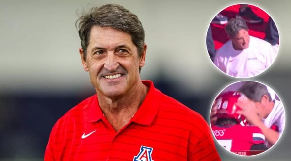 Arizona coach Chuck Cecil headbutt's a player on helmet and immediately starts bleeding