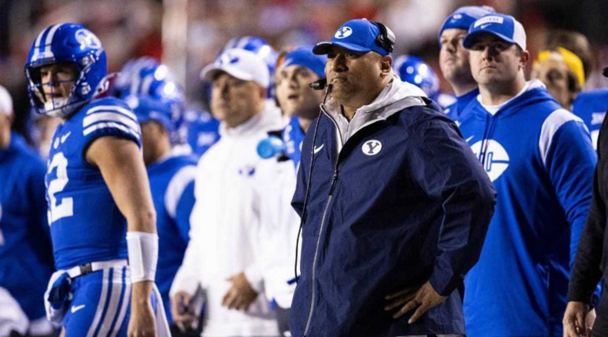 BYU coach Kalani Sitake with his team