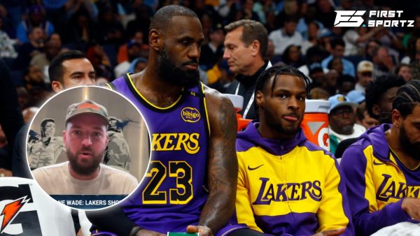 Bronny James on bench with his dad, LeBron James