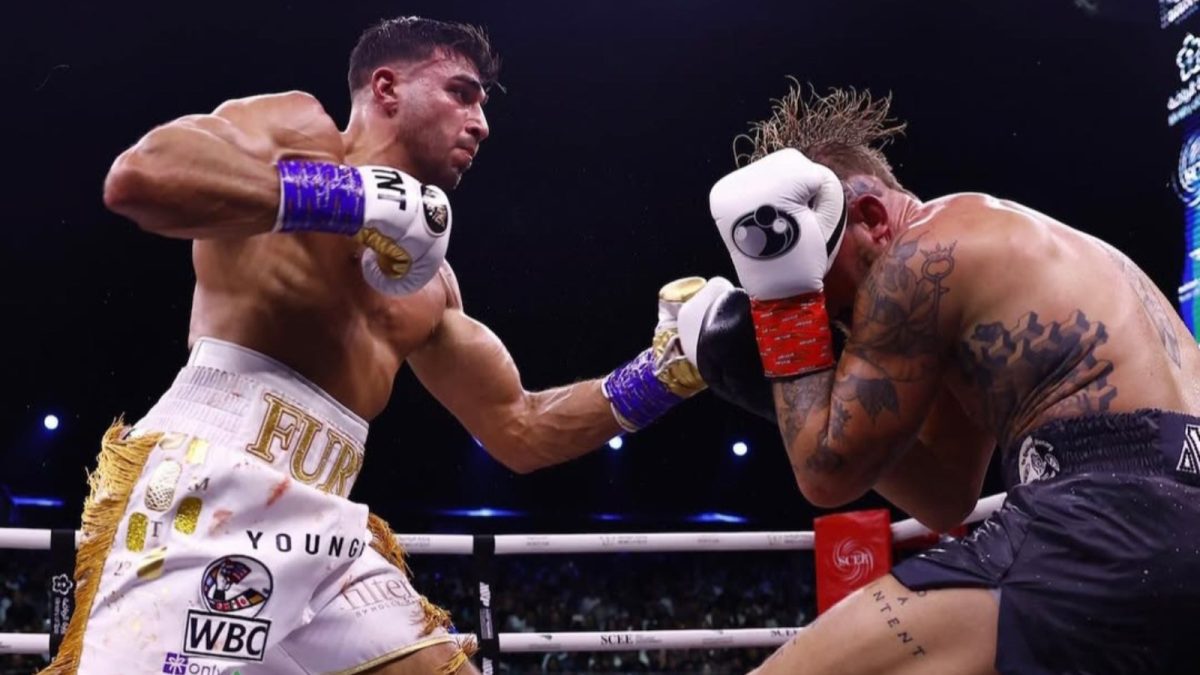 Jake Paul and Tommy Fury in action 