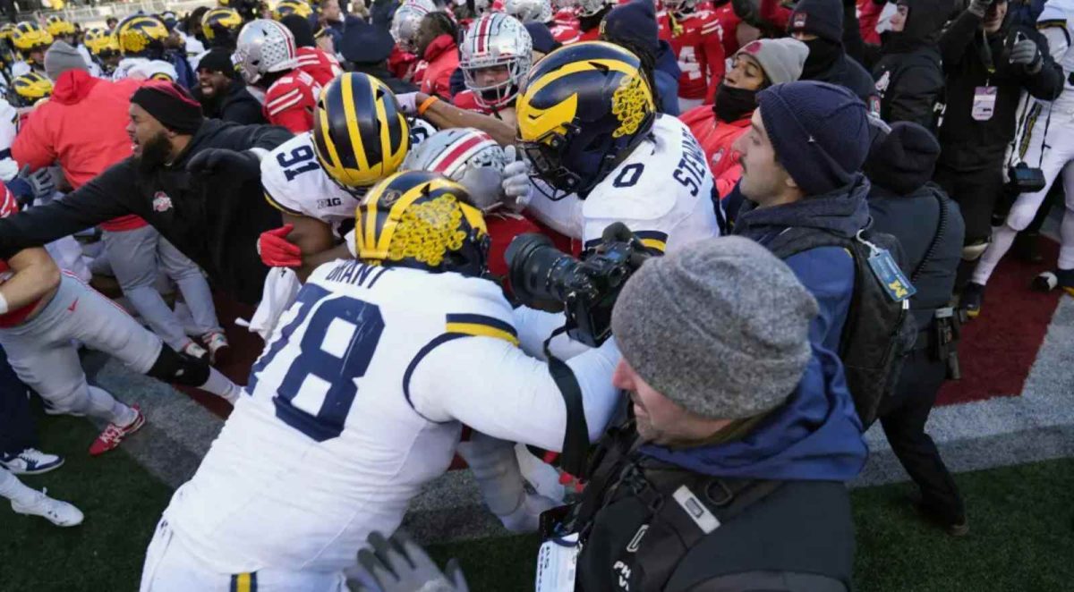 Michigan Wolverines and OSU players get into it