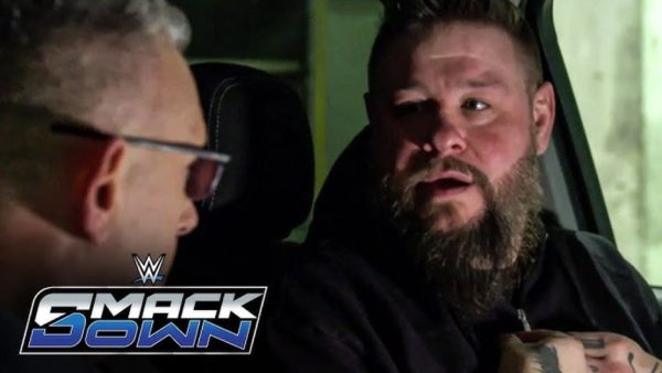 Kevin Owens and Michael Cole