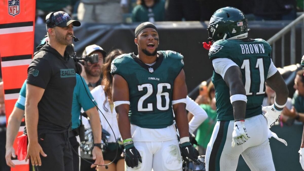(Video) Eagles HC Nick Sirianni's reaction to getting a kiss from Chad Johnson out of nowhere mid-press conference goes viral 3 Nick Sirianni with Saquon Barkley and AJ Brown