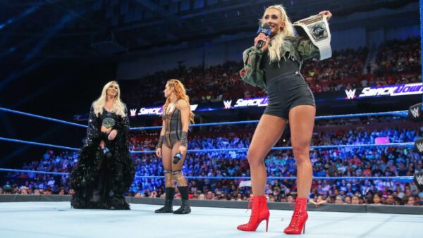 Carmella with Becky Lynch and Charlotte Flair